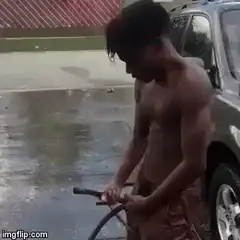 Naked man gets blasted by hose