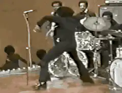 James Brown dancing on stage