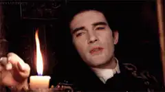 Antonio Banderas blows out a candle