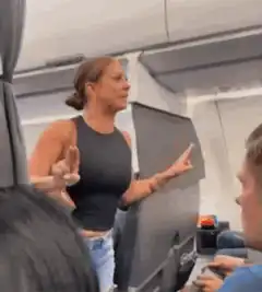 Angry woman yelling on airplane