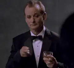 Bill Murray nodding with drink
