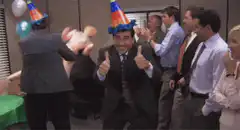 Michael Scott gives thumbs up at office party