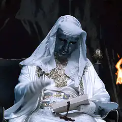 The Pope waving while reading