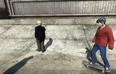 Skateboarder hits old man with helmet