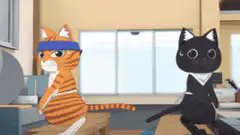 orange cat and black cat sitting
