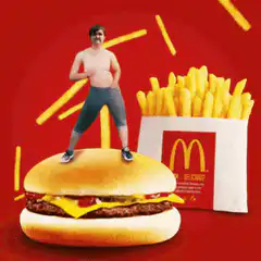 Man dancing on a McDonald's burger