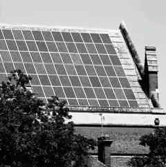 Go Solar sign on roof