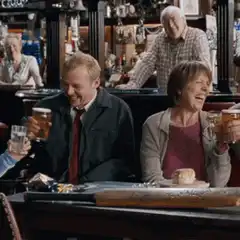 Simon Pegg drinking beer in a pub