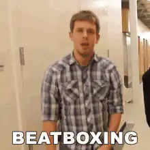 beatboxing guy in plaid shirt