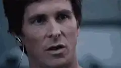 Bruce Wayne smiles