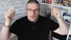 Man pointing down with both hands