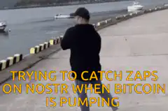 Man fishing while trying to catch Zaps on Nostr