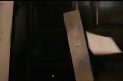 Letter sliding through mail slot