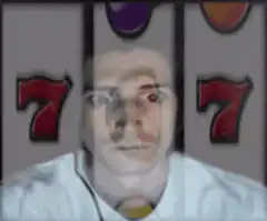 Man watching slot machine reels spin