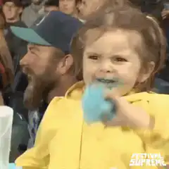 Girl eating blue cotton candy powers up