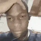 Man rubbing forehead looking tired