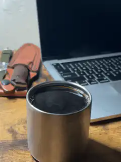 steam rising from coffee cup