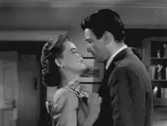 Man and woman kiss passionately