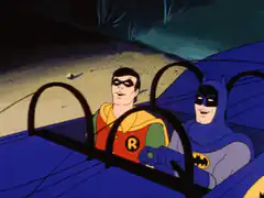 Batman and Robin in the Batmobile