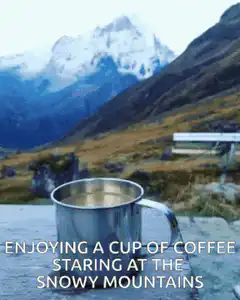 Coffee cup with snowy mountains