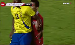 Brazilian soccer player elbowing opponent