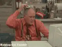 Man scratching head in confusion