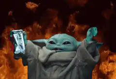 Baby Yoda holding a bag of chips in front of fire