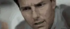 Tom Cruise and Olga Kurylenko intense stare