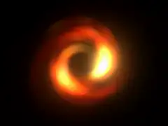 Spinning orange and yellow energy vortex