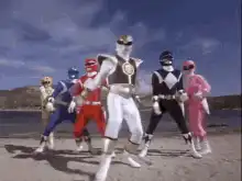 Power Rangers dancing on beach