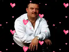 Burt Reynolds with floating pink hearts