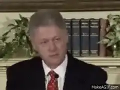 Bill Clinton talking and pointing