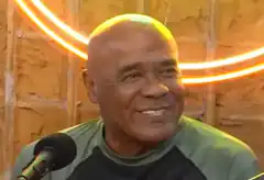 George Foreman smiling at microphone