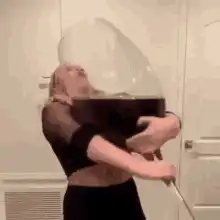 woman holding giant wine glass