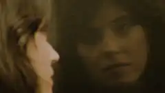 Woman looking at her reflection