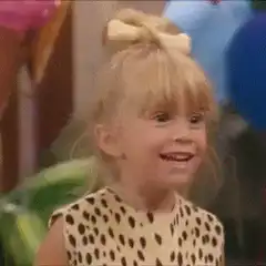 Excited little girl with bow