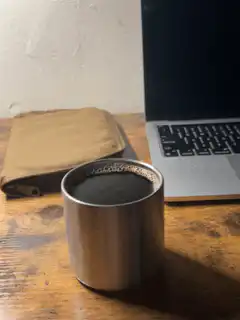 steam rising from coffee cup