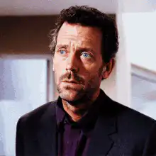 Hugh Laurie facepalm and look up
