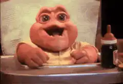 Baby Oscar the Grouch eating