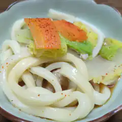 Bowl of udon noodles with vegetables