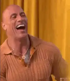 Dwayne Johnson laughing hysterically