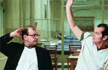 Jack Nicholson and Lloyd Sherr raising hands