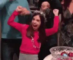 Girl puts on tiara and cheers