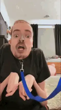 Man with leash and extra hands
