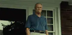 Old man pointing finger at camera