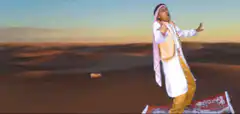 Man on flying carpet in desert