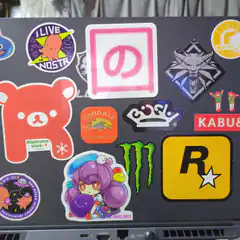 laptop covered in stickers