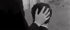 Hand stroking hair