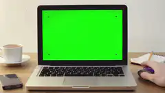 Laptop with green screen showing #zapathon