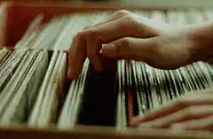 Hand browsing vinyl records